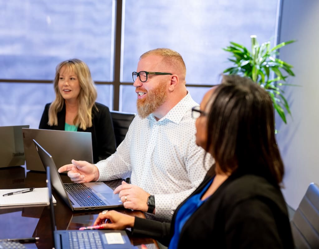 Team members communicating during a meeting